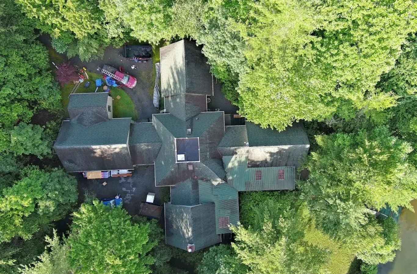 Secure Roofing crew installing a new roof in Lake Lure, NC, showing the advantages of hiring skilled and experienced local roofing specialists.