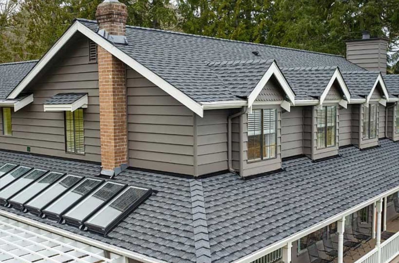 Secure Roofing team repairing a residential roof in Haywood County, NC, showing the advantages of hiring trusted local experts.