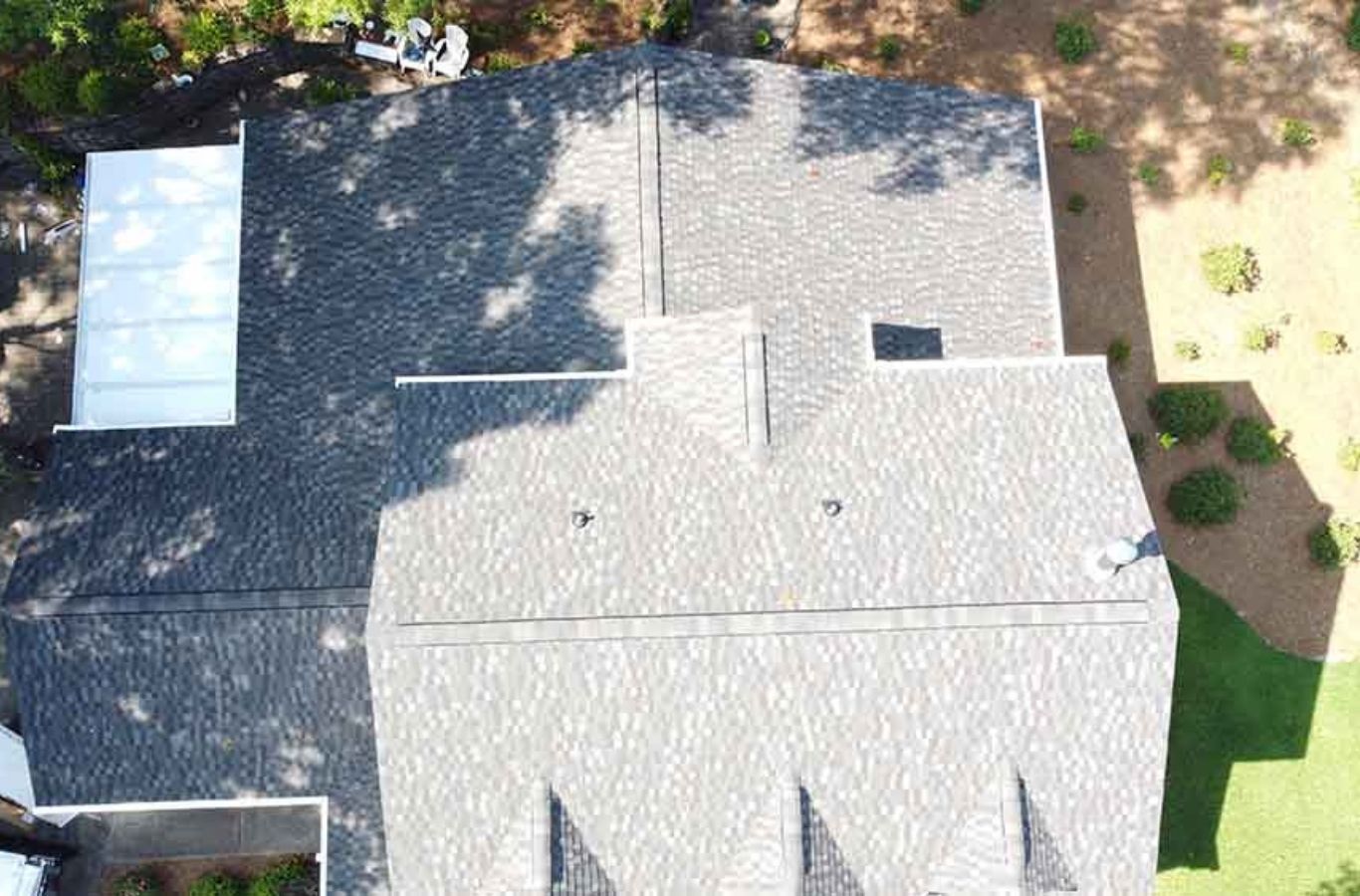 A Secure Roofing professional completing a roof replacement in Brevard, NC using quality materials and expert tools for lasting protection.