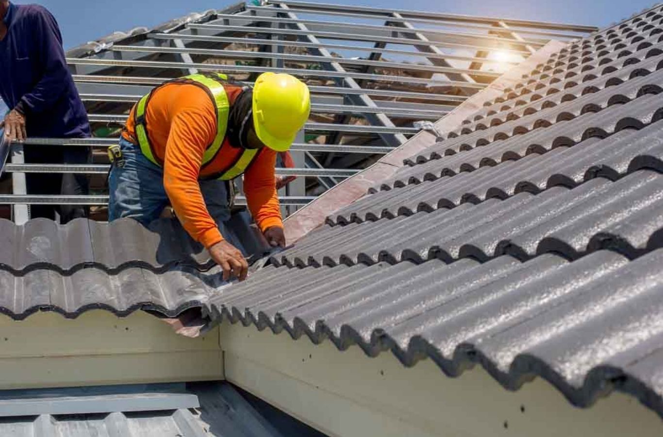 Roof Replacement in Greenville, NC by Secure Roofing A Secure Roofing professional completing a roof replacement in Greenville, NC using quality shingles and expert tools for durable results.