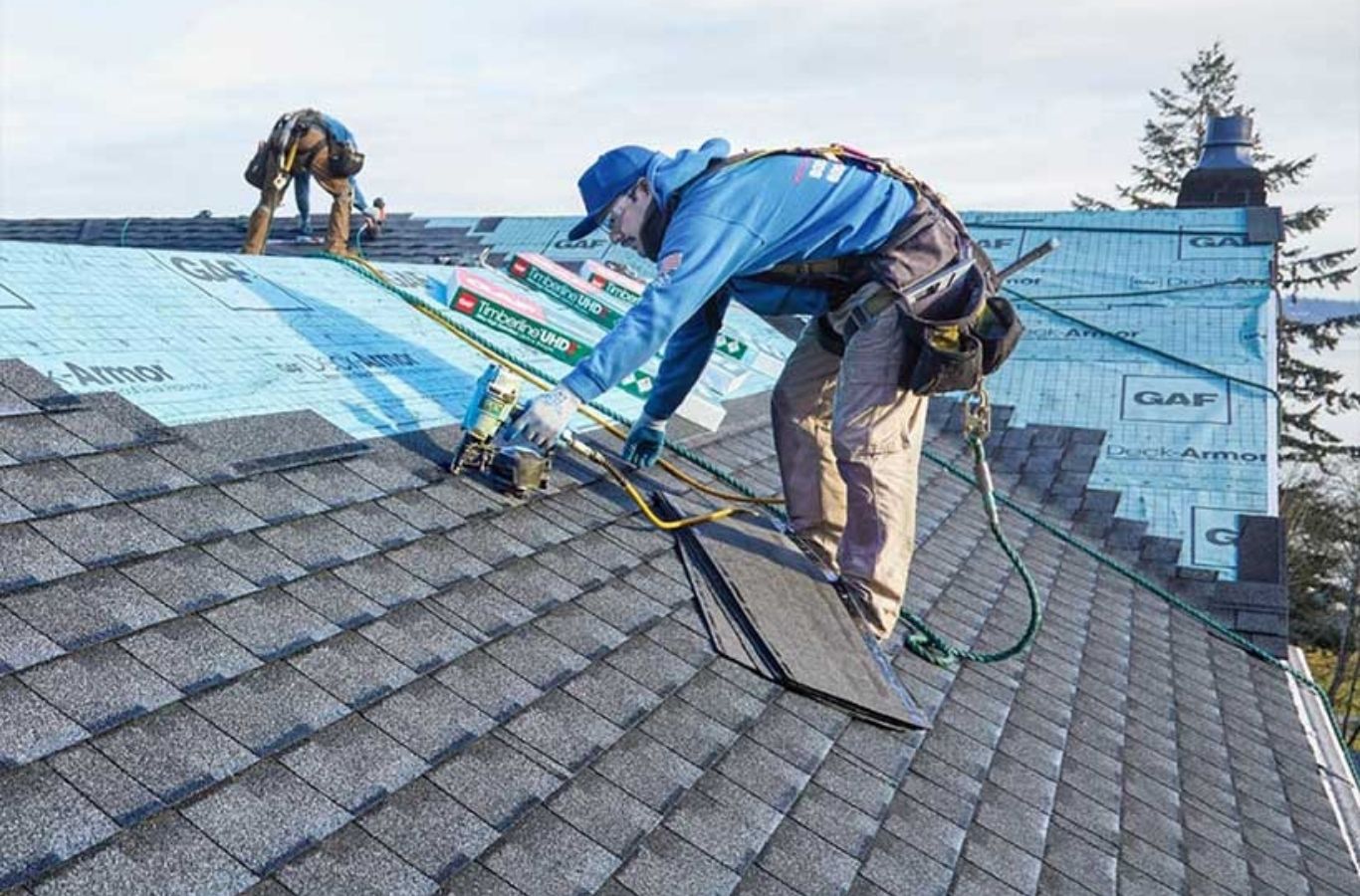 A Secure Roofing professional installing a high-quality roof in Henderson County, NC with expert tools and precision for lasting protection.