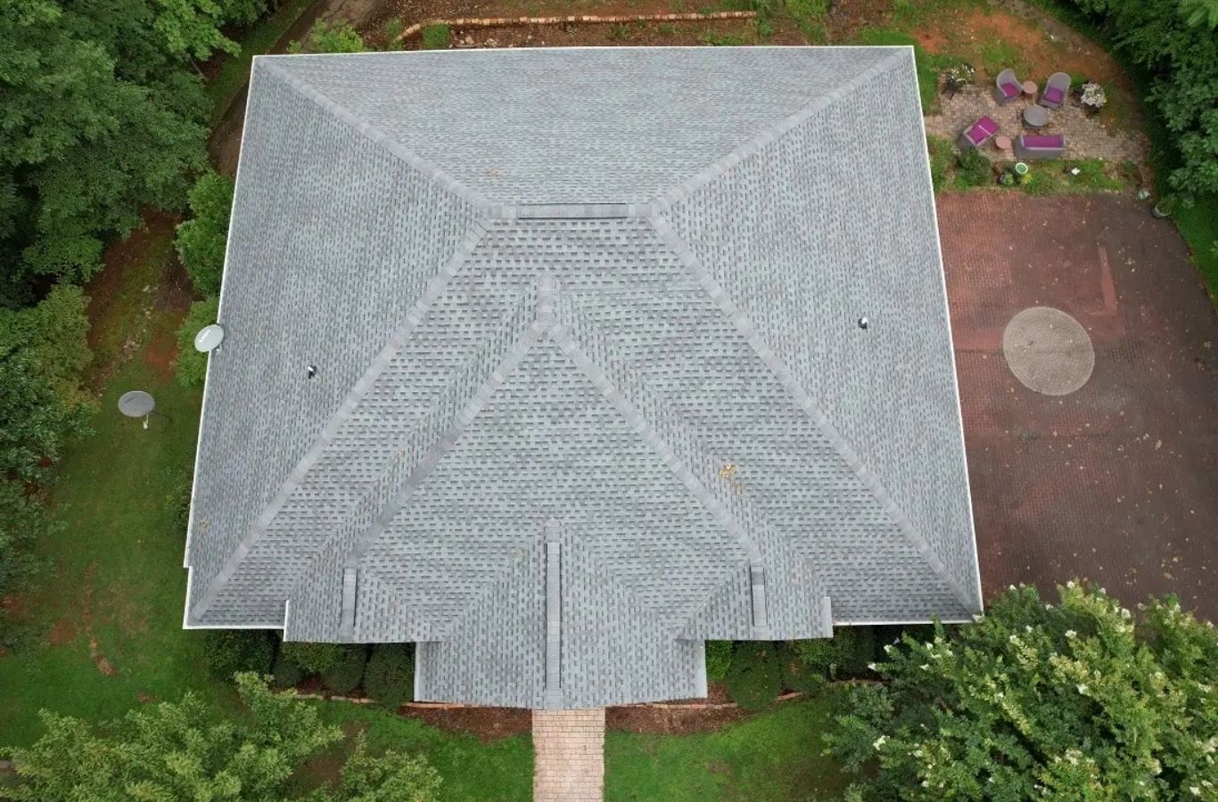 A Secure Roofing roofer performing residential roofing in Fletcher, NC, demonstrating skilled techniques and the value of hiring a trusted local professional.