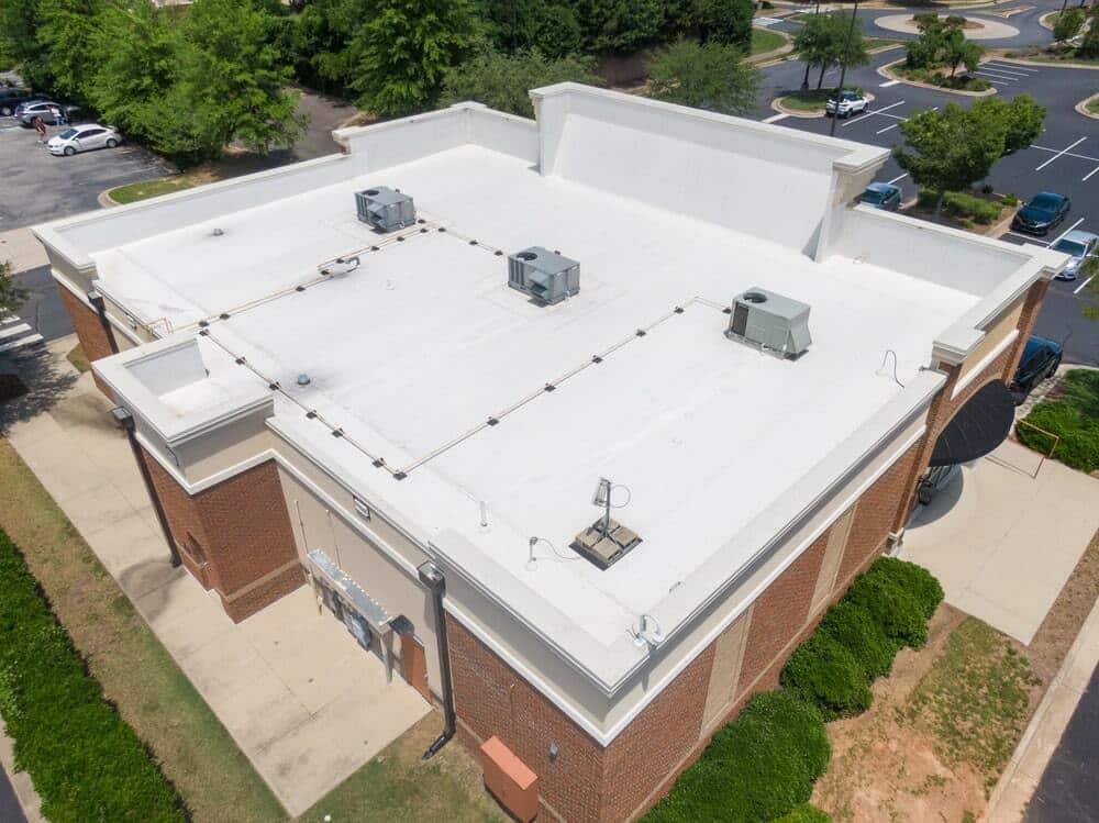 Flat Roof vs. Metal Roof for Commercial Buildings: Making the Switch in WNC