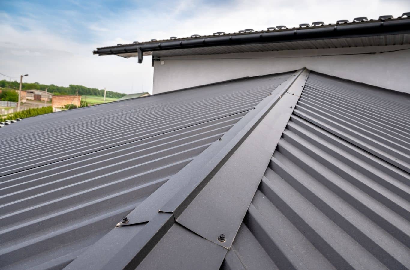 Secure Roofing expert installing metal roofing in Hendersonville, NC demonstrating precision and reliability. Metal Roofing Near Me.