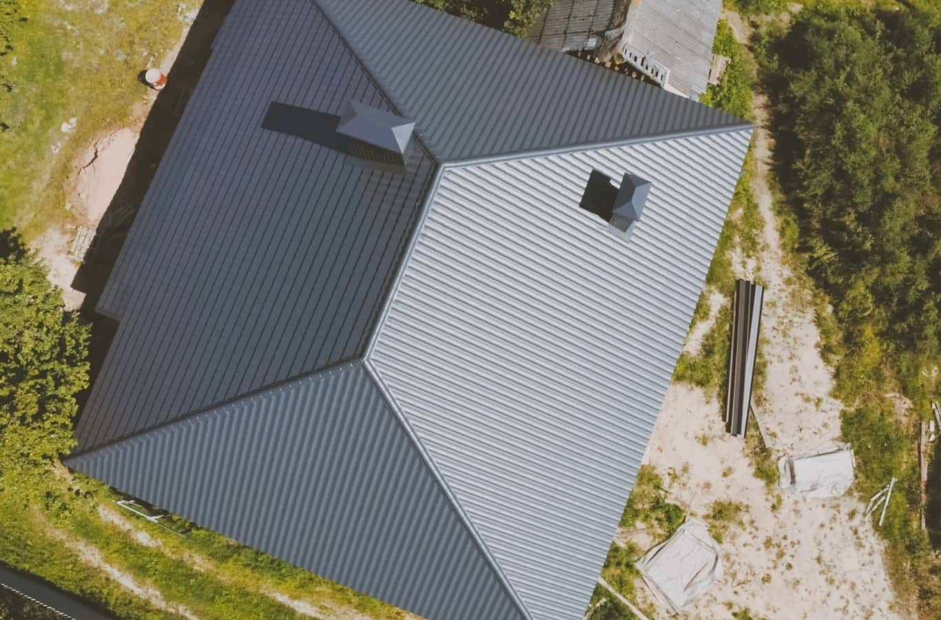 Secure Roofing professional inspects roofing in Brevard, NC using specialized tools for accurate roof evaluation.