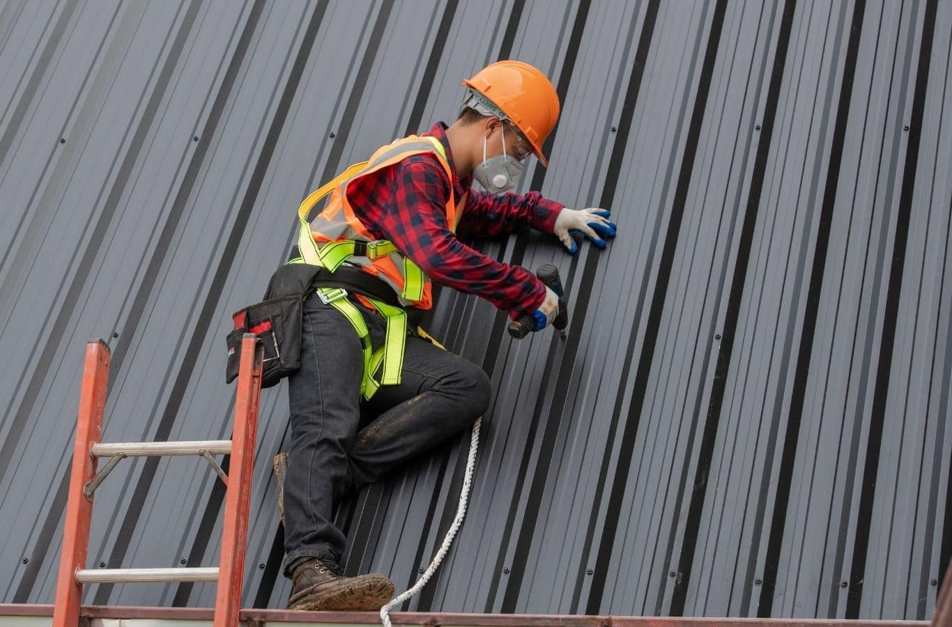 Secure Roofing professional inspects roofing in Black Mountain, NC using proper tools for dependable roof care.